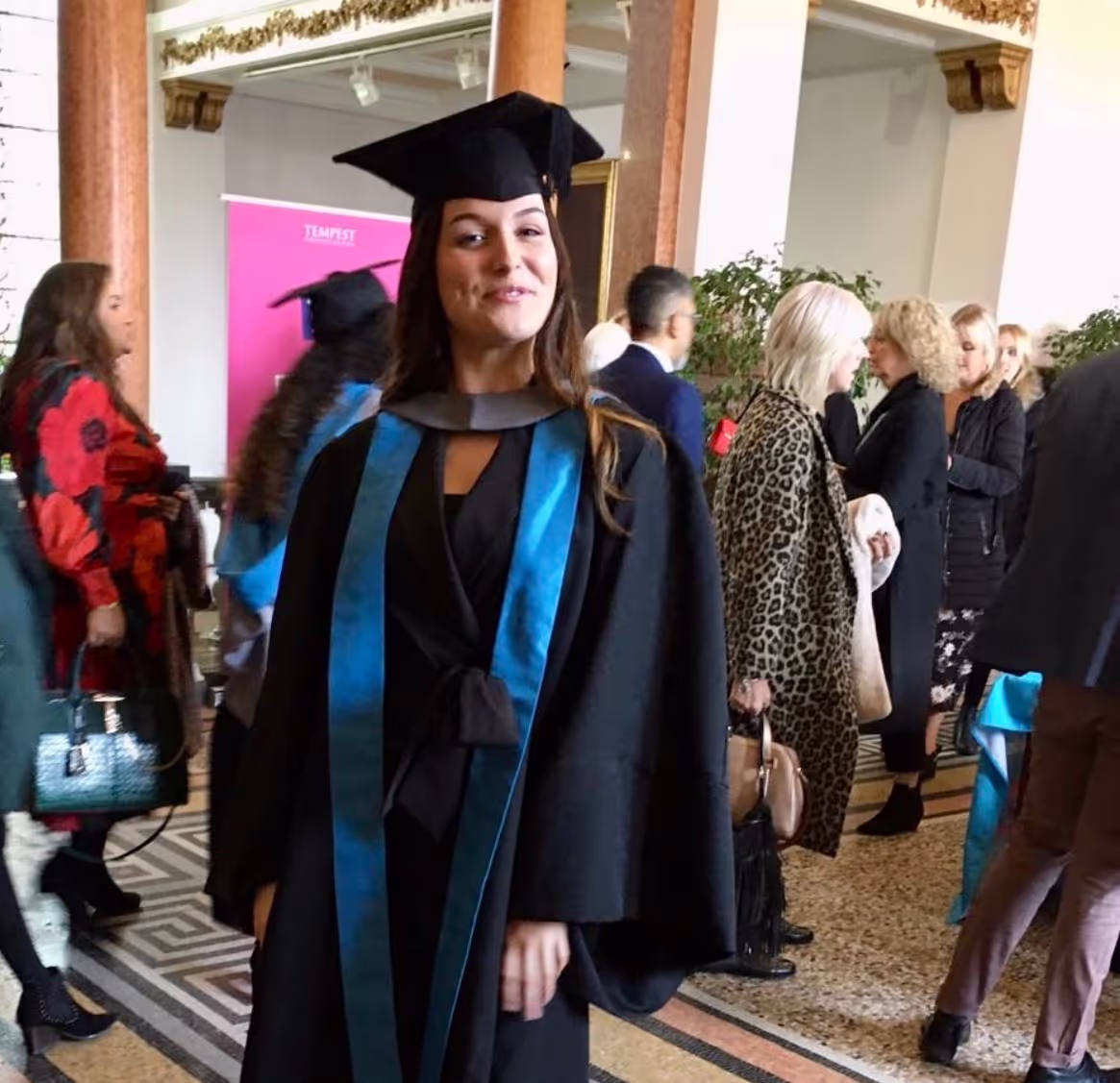 Marley in robes on her graduation day